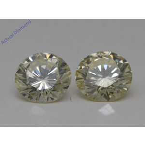A Pair Of Round Cut Loose Diamonds (1.49 Ct,Yellow(Irradiated) Color,Si1 Clarity)