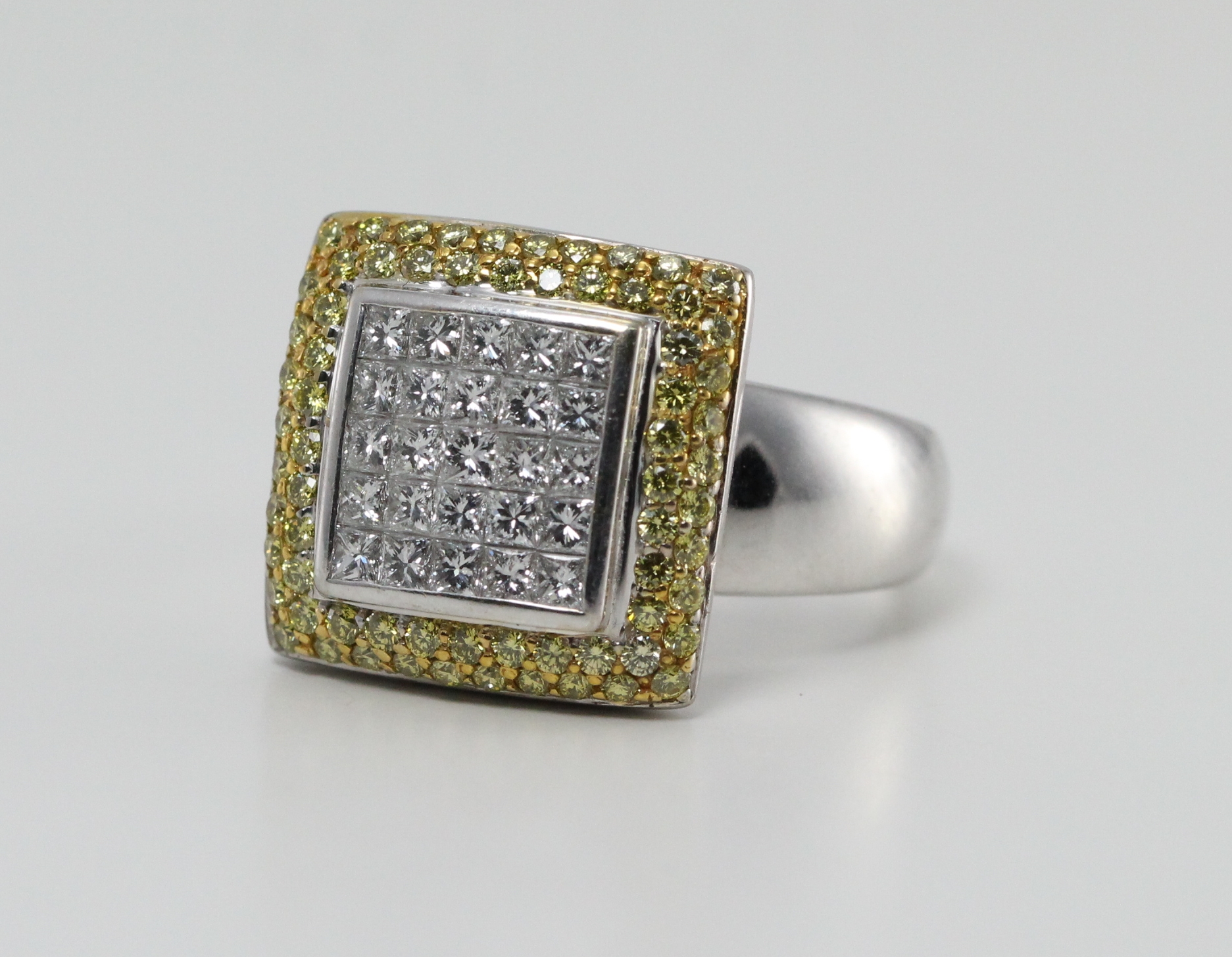 Princess cut yellow and white diamond cocktail ring