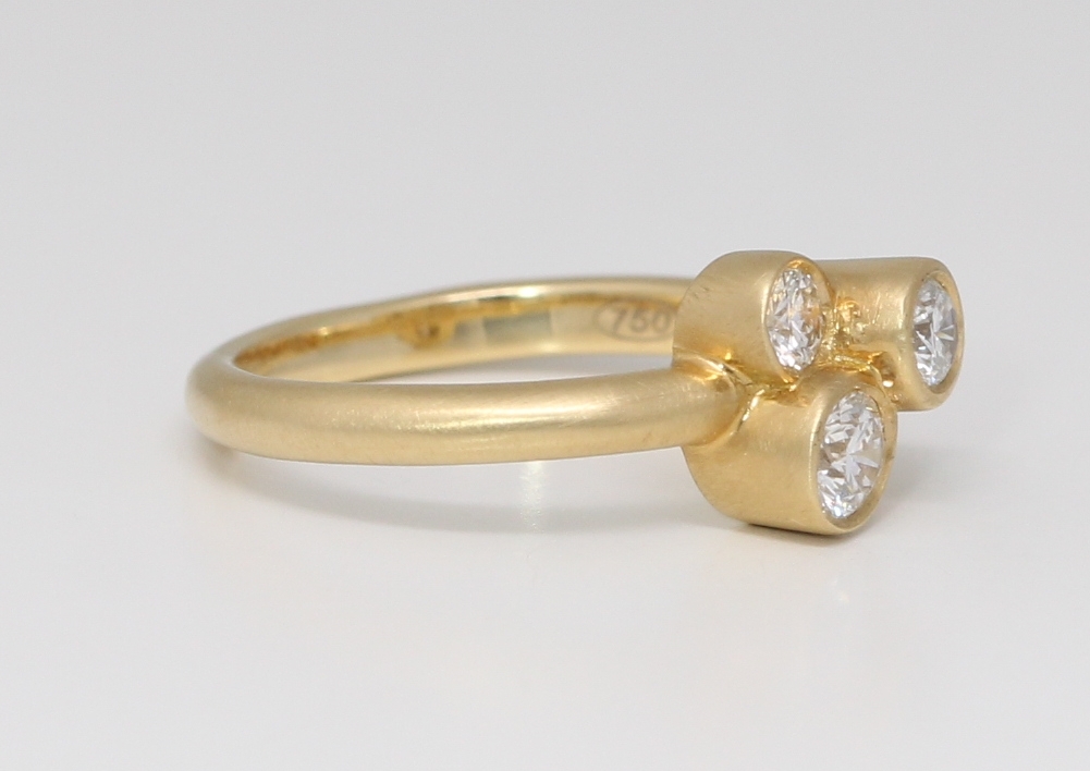 Step Bezel 18K Yellow Gold Three Stone Round Diamond Asymmetrical Step Bezel Set ...