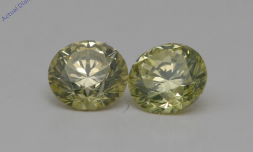 A Pair Of Round Cut Loose Diamonds (0.8 Ct,Yellow(Irradiated) Color,Vs1 Clarity)