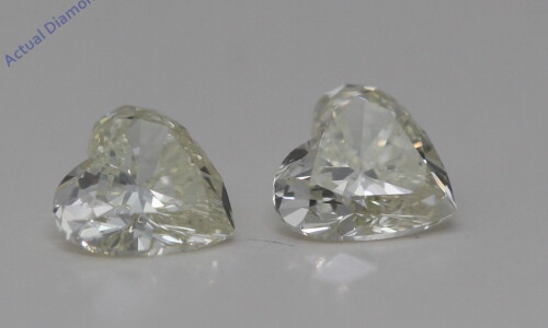 A Pair Of Heart Cut Loose Diamonds (0.83 Ct,J Color,Vs2 Clarity)
