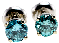 blue color enhanced diamond stud earrings